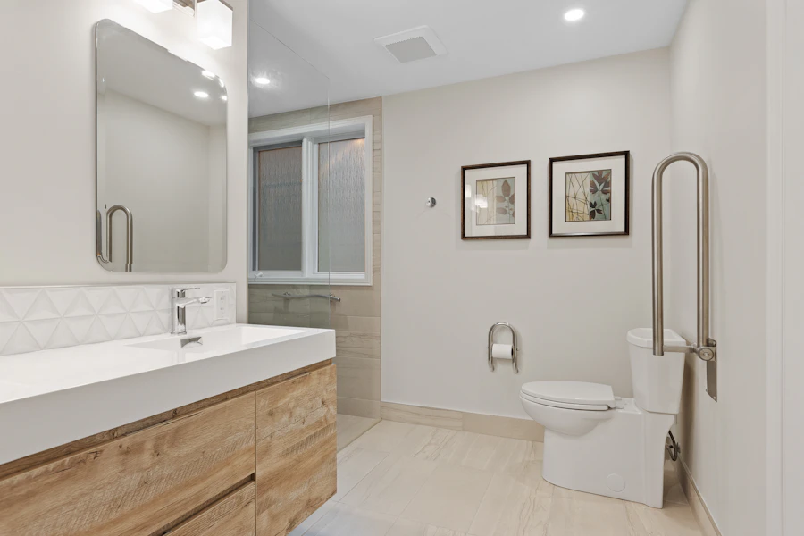 Bright bathroom with a wall-hung vanity, grab bar and walk-in shower